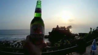 Download Lagu Bintang Beer and Sunset at Tanah Lot Temple, Bali, Indonesia MP3