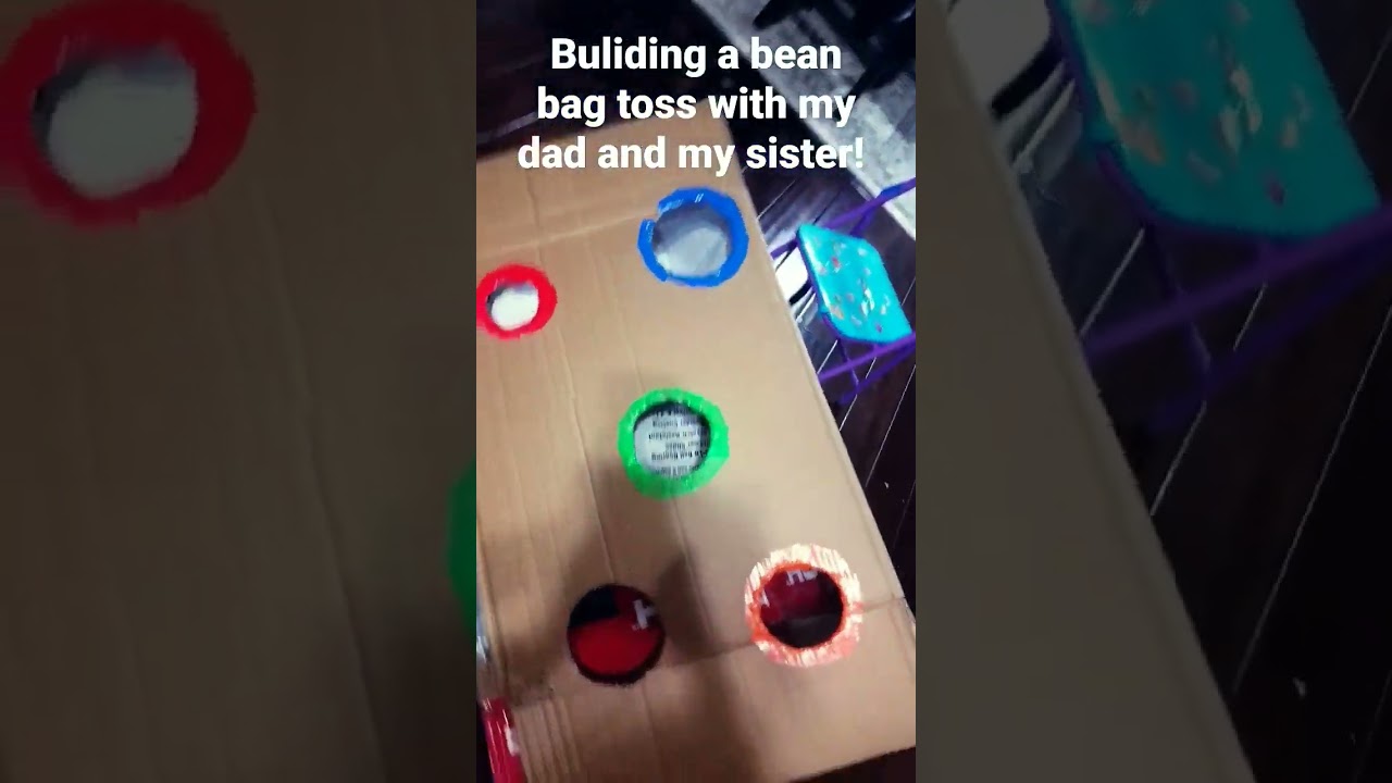Building a bean bag toss with my dad and my sister!