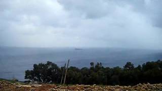 Fawwara & Dingli cliffs with Filfla in the Background