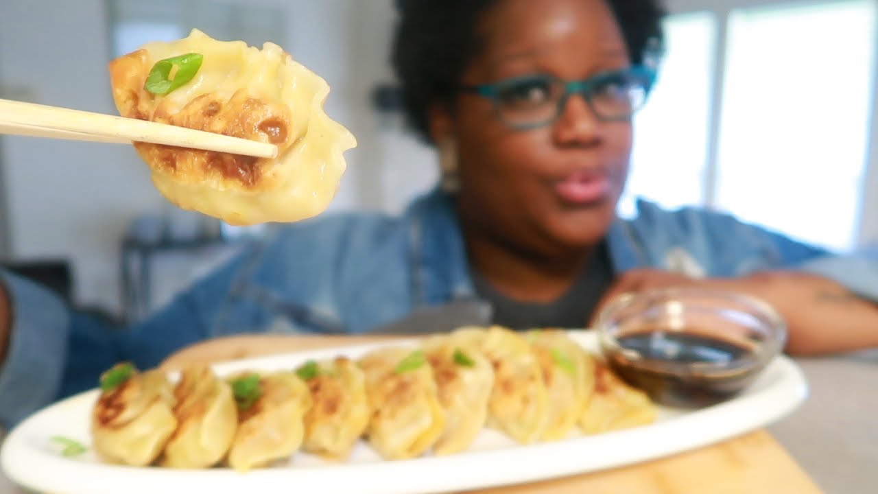 Asian Pork Dumplings Cooking and Eating