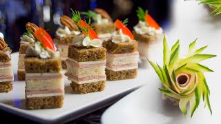 Snack like a cake - pecan nuts,  mortadella and cucumber flowers