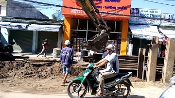 Nhổ cọc ván thép bằng máy đào