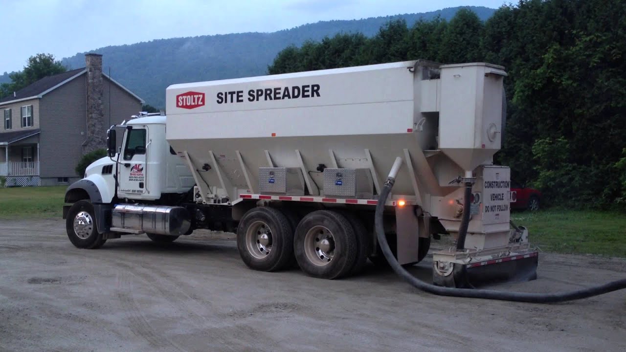 Loading Cement into a Stoltz Site Spreader - YouTube