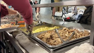 Volunteers serve up Thanksgiving joy and dignity at St. Vincent de Paul Kitchen