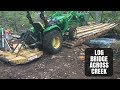 Building Log Bridge Across Rushing Creek