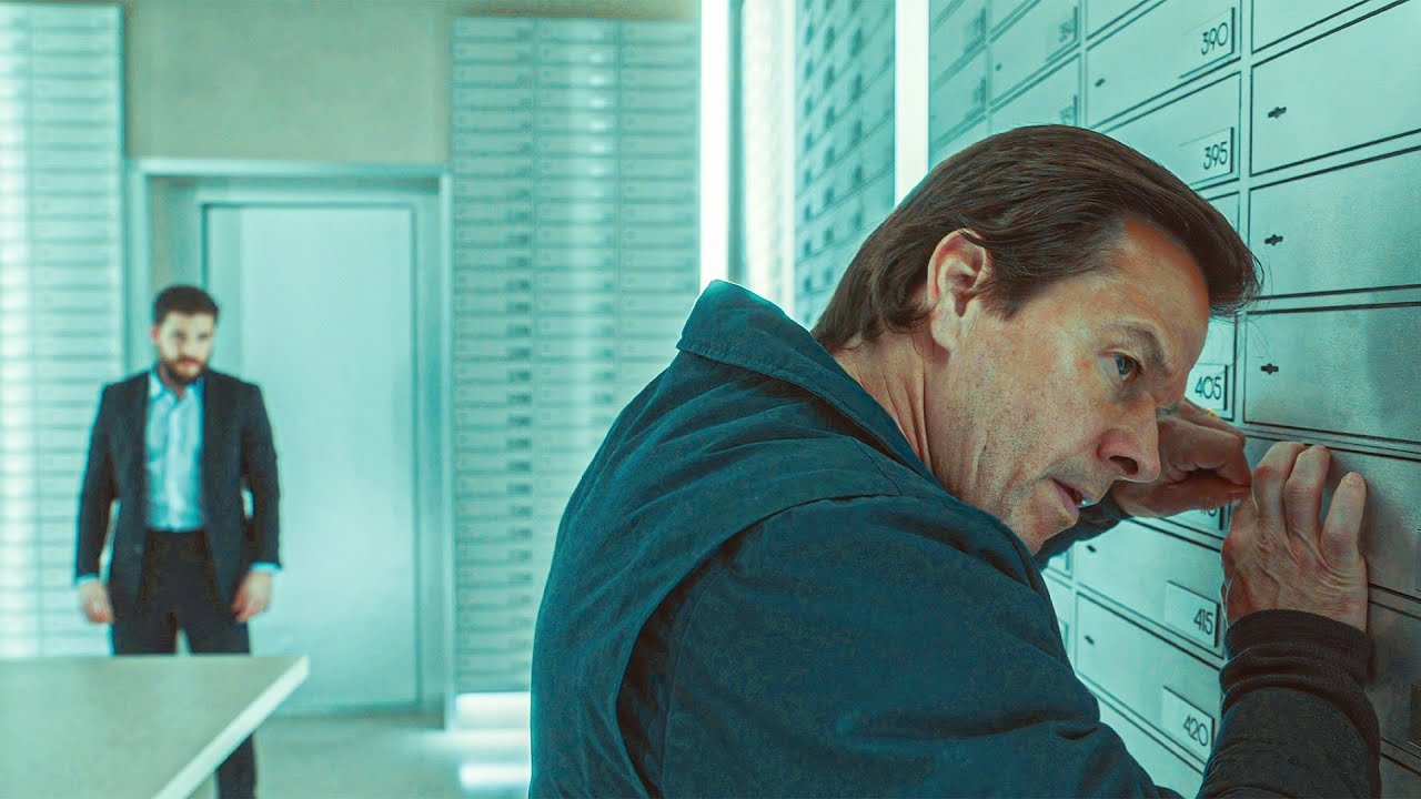 A Retired Assassin Is Forced to Steal a Digital Key From a Bank That Controls the Entire Underworld