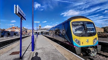 6 Cars of TPE Class 185 depart a sunny Scarborough - Departure -