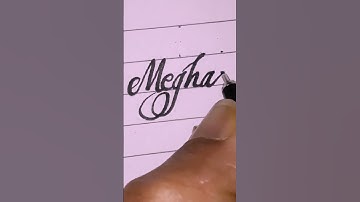 "Megha" Name In Cursive Handwriting