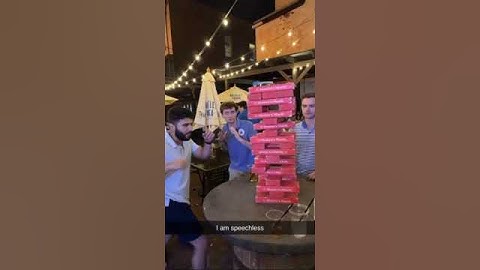 Guy punches giant jenga piece out @drunkpeopledoingthings on Instagram #shorts #giant #jenga #bar