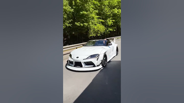 Golkowicki_Han jeździ TOYOTA SUPRA MK5 TARGA LIBERTY WALK SE7EN by Budda