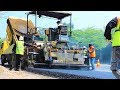 Asphalt Paving Road Using Hot Mix And Compacted With Tandem And Tire Roller