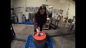 Sampling Barrels at the Winery