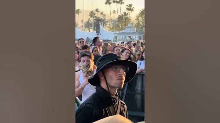 Sabrina Carpenter waving to Barry Keoghan during her Coachella performance.