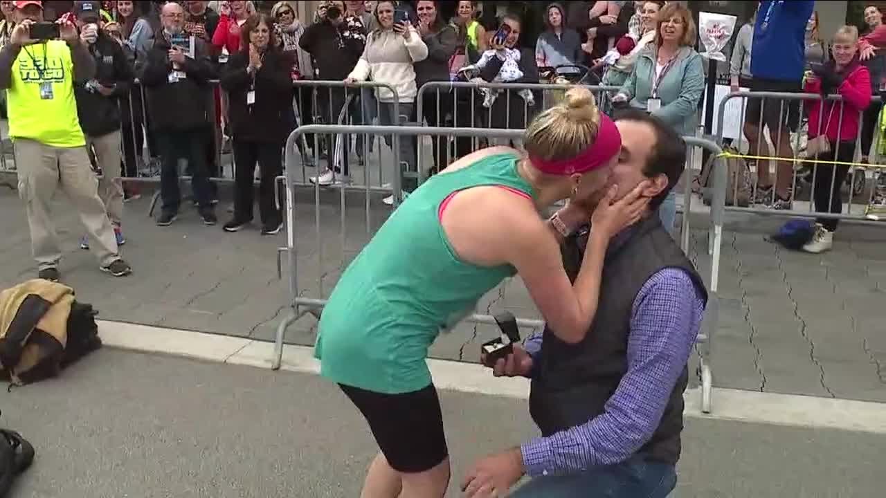 Akron Half Marathon runner gets surprise proposal after crossing finish