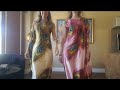 Two sisters trying out dresses made by their own personal designer and best friend Bitti Santos