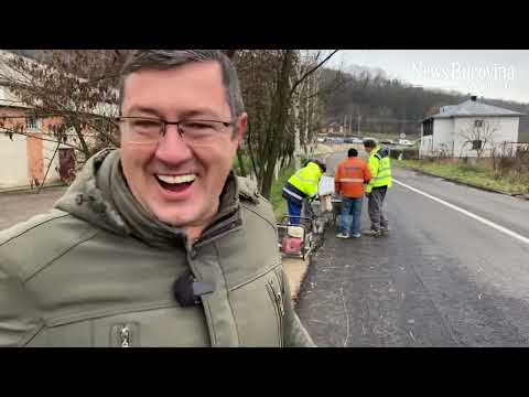 Să fie BAL !! Întâi au astupat trotuarul ca sa lărgească strada! Acum sparg asfalt sa faca trotuar!