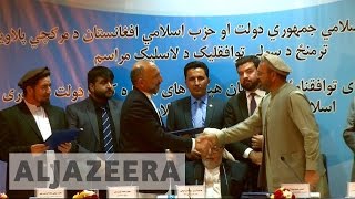 Afghan government signs peace deal with armed group