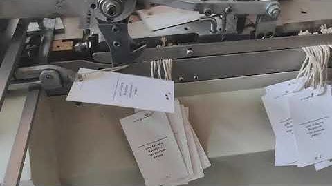 Fully automatic rope threading machine for one tag two tag