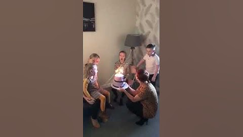 Guy Reacts Excitedly at Football Team Winning Goal During Birthday Cake Cutting - 1031776