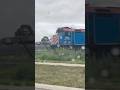 Metra #122 pushes a train through the rain!