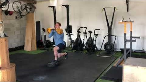 KB Front Rack Deficit Reverse Lunge