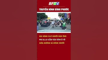 Hãi hùng clip người đàn ông phi dao cắm vào kính ô tô giữa đường sá đông người #shorts  | BPTV