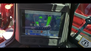 Setting up the auxiliary hydraulics on a Takeuchi TL12V2.