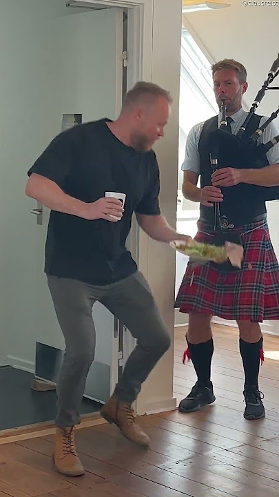 Sudden Bagpipes Startle Coworker || ViralHog