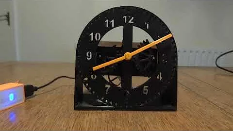 Two Servo Clock using Arduino IDE to program ESP8285 (ESP8266 compatible) board.