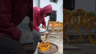The Process Of Shredding Pumpkin Into Long Strips