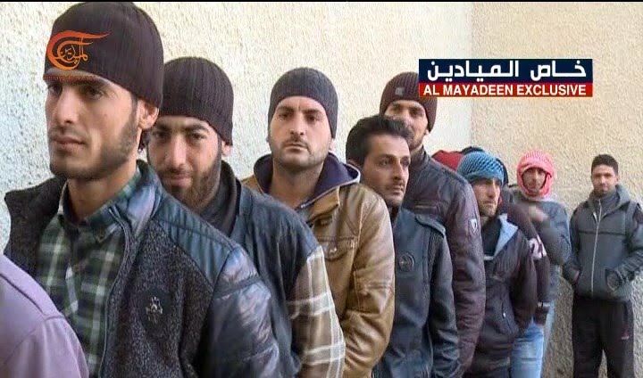 تسوية أوضاع مئات المسلحين بريف دمشق