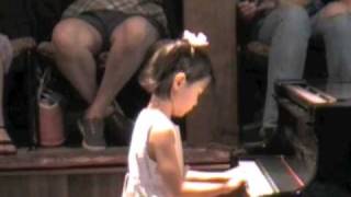 Iris, age 5, first recital after 8 piano lessons