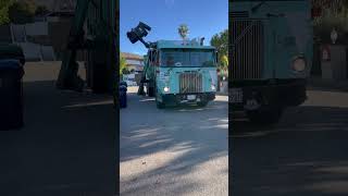 Old garbage truck on trash collection age