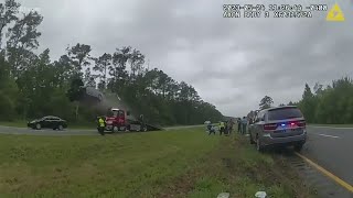 Car goes flying after woman drives it off tow truck ramp in Georgia