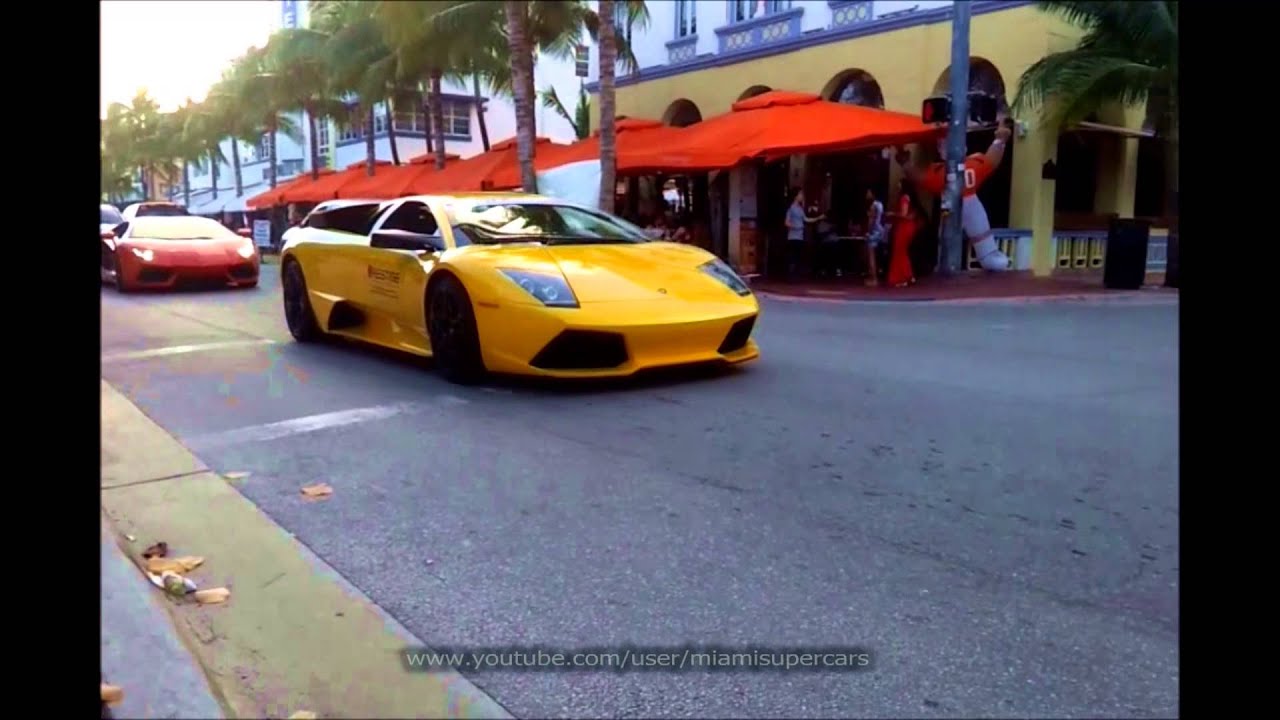 Yellow Lamborghini Murcielago And Orange Lamborghini Aventador Driving