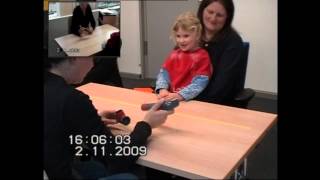 Girl Attempts Pipe Assembly Task