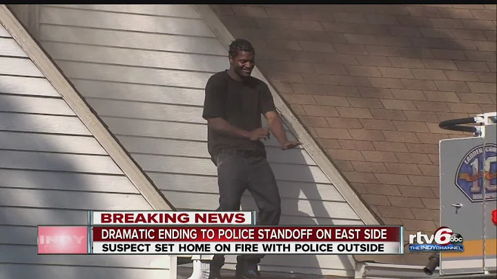 VIDEO: Man in police standoff dances on roof