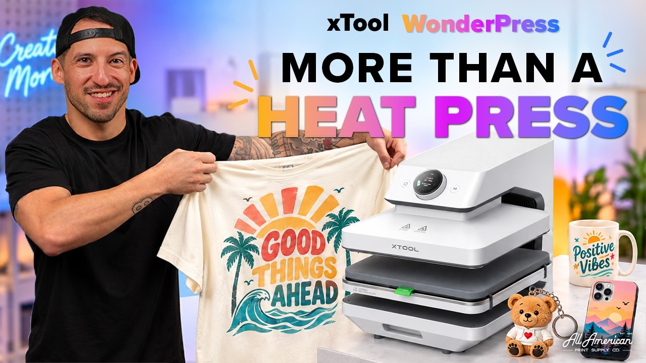 All American Print Supply video on the xTool WonderPress, with a printed tee, a mug, a bear figure and a phone case beside the machine