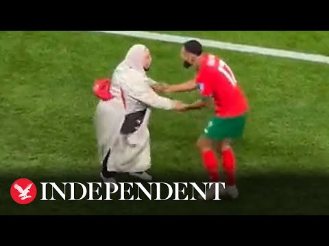 Morocco player celebrates by dancing with his mother after World Cup win