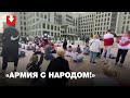 Протестующие сидят напротив Дома правительства