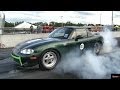 TESLA P85 Gets ZAPPED by Electric MIATA !!  - 1/4 mile Drag Race Video - Road Test TV ®