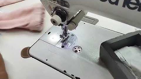 Care label attach with inseam closed tack.