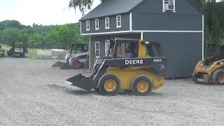 2012 John Deere 326D skid steer loader with bucket