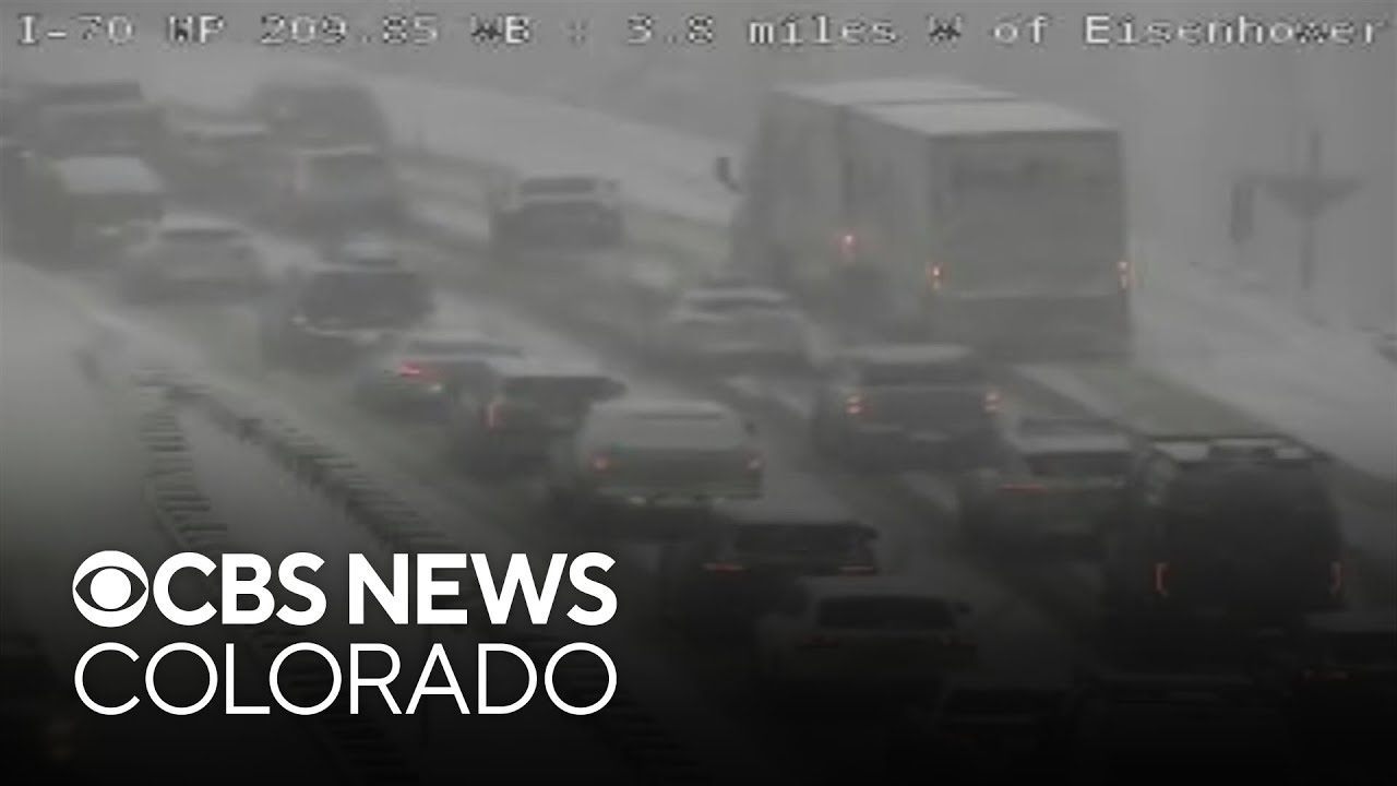 Heavy snow in Colorado causes significant delays along I-70 - YouTube