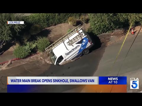 Loz Feliz water main bursts, sinkhole swallows Spectrum van