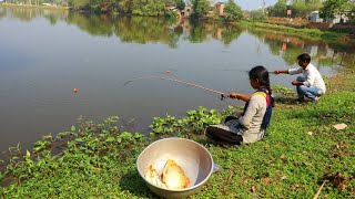 Fishing Video || Two skilled fishermen are fishing with hooks in the village pond || Fish hunting