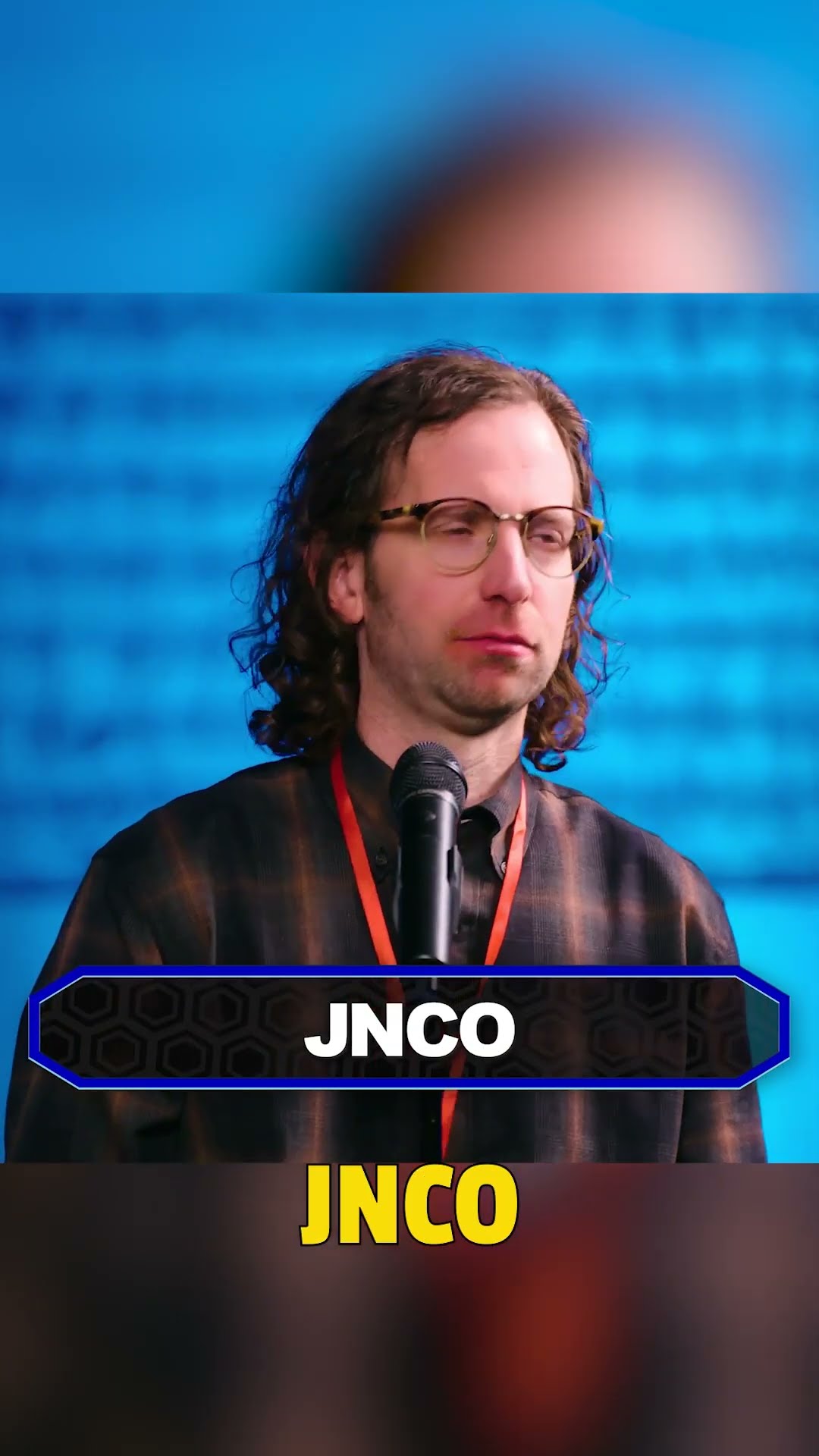 Fred Dust and Kyle Mooney compete in a Y2K-themed spelling bee ?