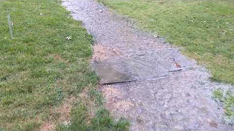 River in my back yard drainage from neighbor