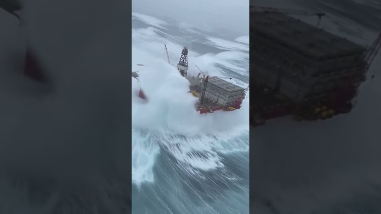 Massive Wave Swallows Offshore Oil Rig 
