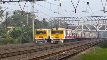Single windshield two EMU local trains made aback to back crossing in the cold morning